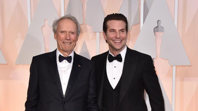 Clint Eastwood and Bradley Cooper at 2015 Academy Awards. wwwmytributejournal.com