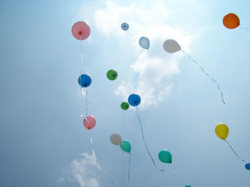 Balloons flying.