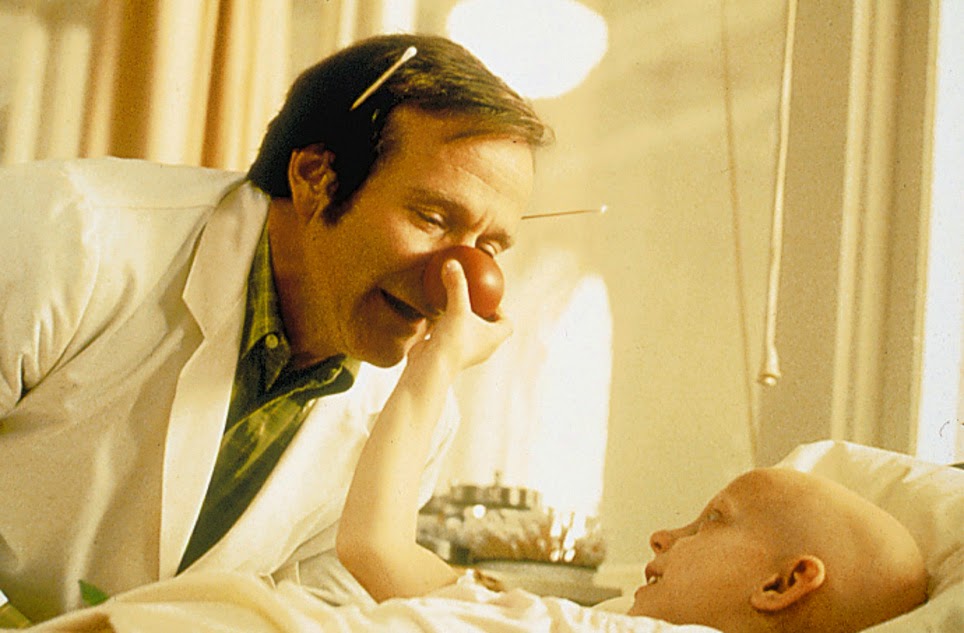 Robin Williams as Patch Adams.